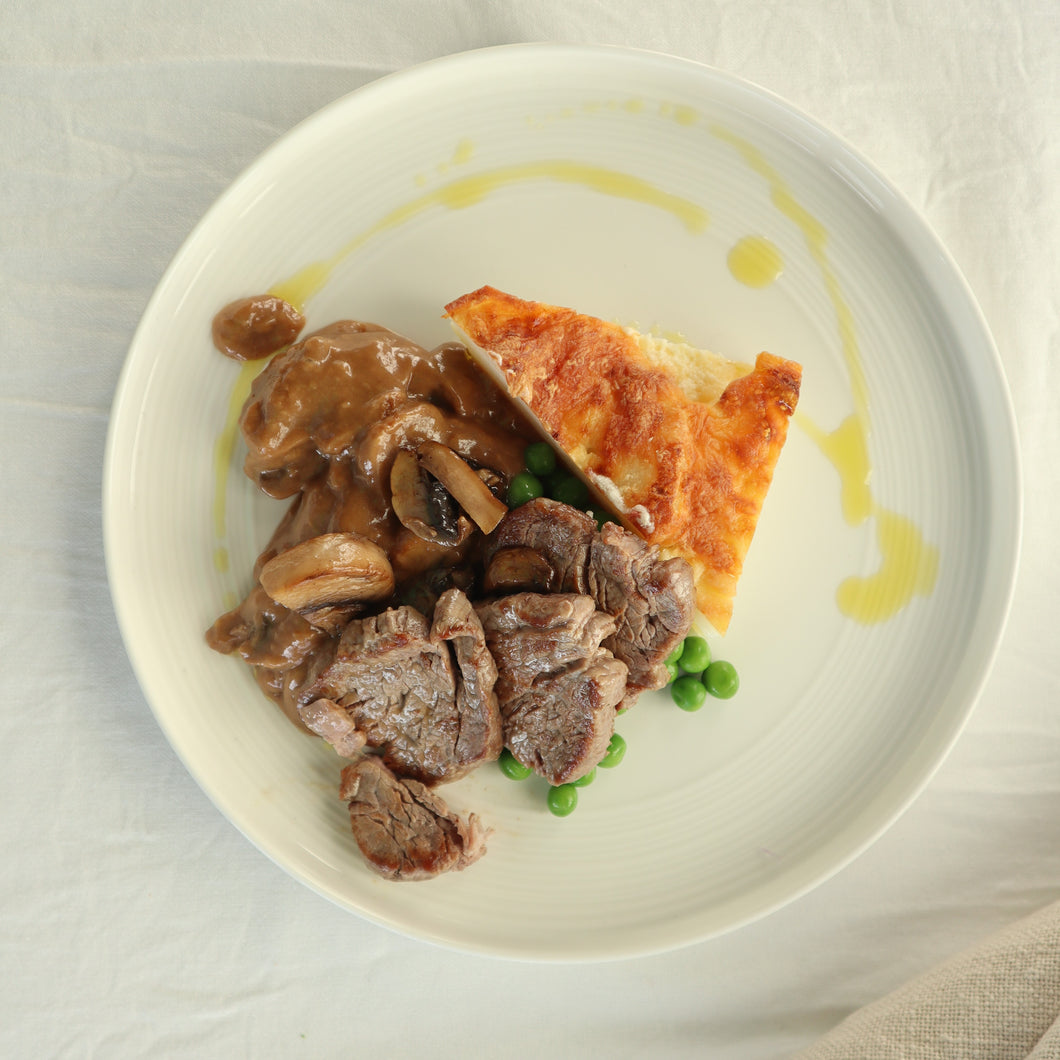 Beef Tenderloin with Mushroom Gravy, Potato Gratin and Peas